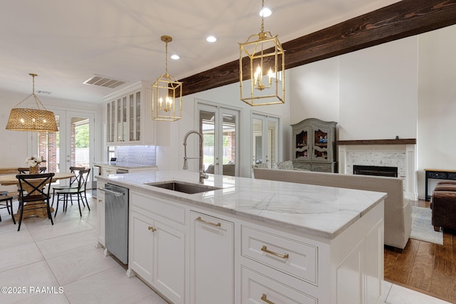 6 Oak Pl, New Iberia, LA 70563 - kitchen featuring a sink, visible vents, french doors, and a chandelier