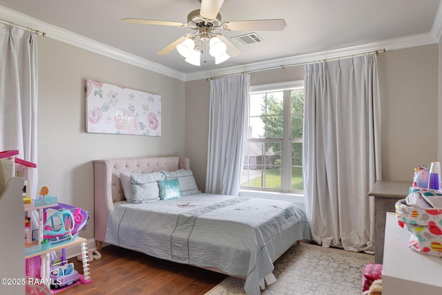 6 Oak Pl, New Iberia, LA 70563 - bedroom with visible vents, ornamental molding, a ceiling fan, and wood finished floors
