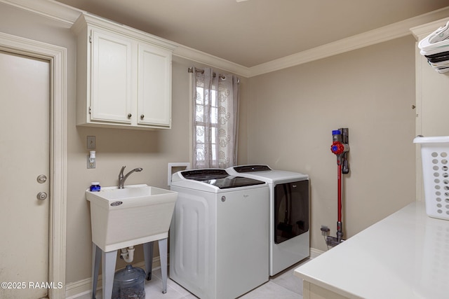 6 Oak Pl, New Iberia, LA 70563 - laundry area with separate washer and dryer, ornamental molding, and cabinet space