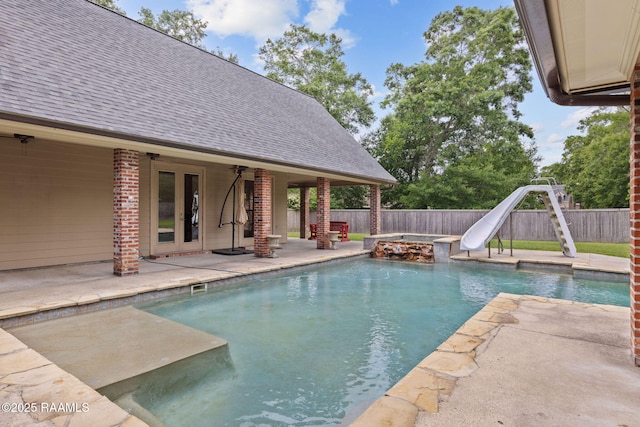 6 Oak Pl, New Iberia, LA 70563 - view of swimming pool with a fenced backyard, a fenced in pool, a water slide, and a patio