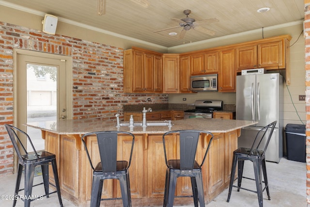 6 Oak Pl, New Iberia, LA 70563 - kitchen featuring crown molding, ceiling fan, appliances with stainless steel finishes, and a sink