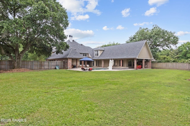 6 Oak Pl, New Iberia, LA 70563 - rear view of house featuring brick siding, a fenced backyard, and a yard