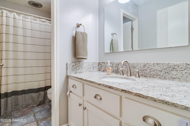 307 Creswell Ave, Scott, LA 70583 - bathroom featuring toilet, curtained shower, and vanity