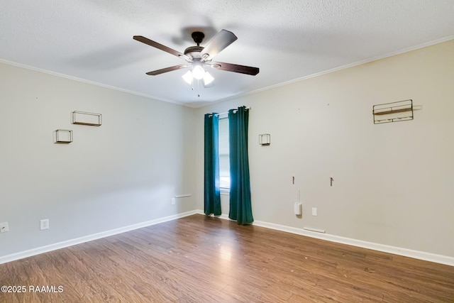 307 Creswell Ave, Scott, LA 70583 - spare room with crown molding, ceiling fan, baseboards, and wood finished floors