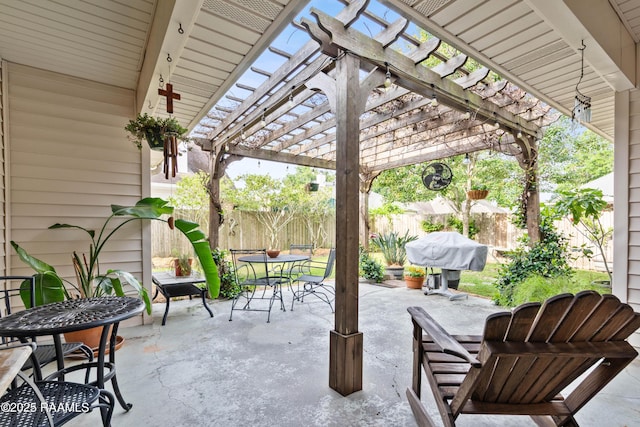 122 Ashford Ln, Youngsville, LA 70592 - view of patio / terrace featuring outdoor dining space, a fenced backyard, a pergola, and a grill