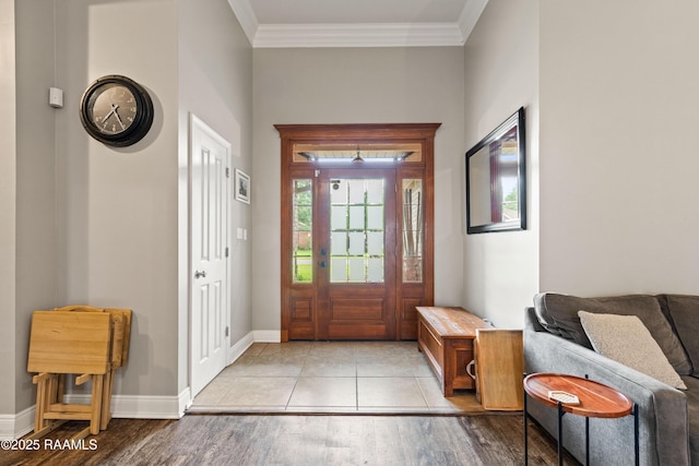 122 Ashford Ln, Youngsville, LA 70592 - foyer entrance featuring light wood-style floors, crown molding, and baseboards