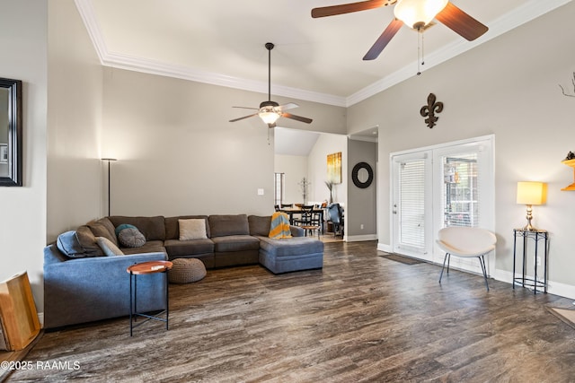 122 Ashford Ln, Youngsville, LA 70592 - living room featuring a ceiling fan, ornamental molding, wood finished floors, baseboards, and lofted ceiling