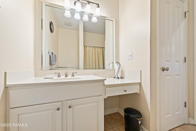 122 Ashford Ln, Youngsville, LA 70592 - bathroom featuring tile patterned floors, vanity, and baseboards