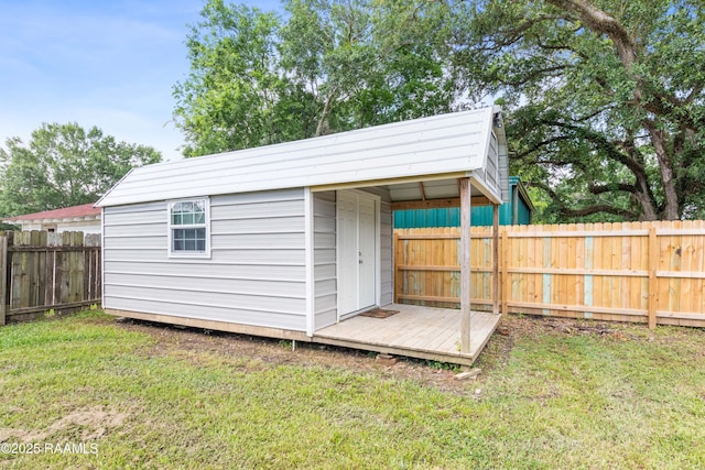 view of shed with a fenced backyard