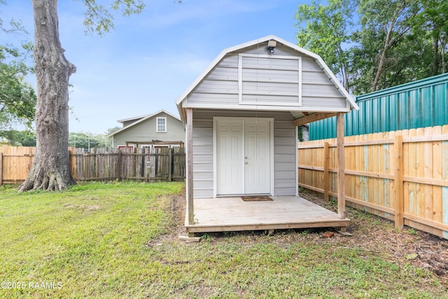 view of shed with a fenced backyard