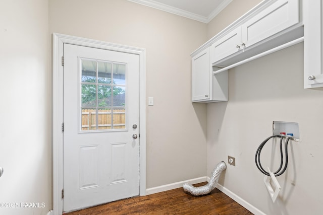 laundry area with ornamental molding, baseboards, hookup for a washing machine, dark wood-style floors, and cabinet space