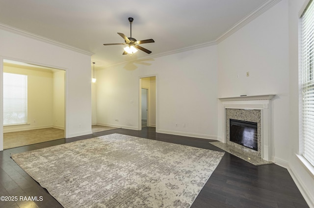 115 Maddox Jude Dr, Maurice, LA 70555 - unfurnished living room with a high end fireplace, ornamental molding, a ceiling fan, and dark wood-style floors