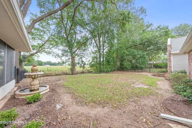 view of yard with fence