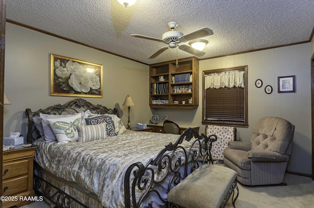 carpeted bedroom featuring crown molding and a textured ceiling