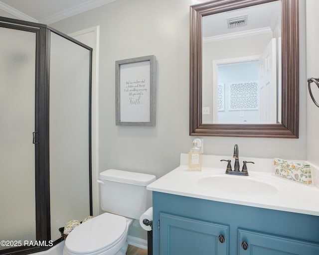502 River Woods Dr, Lafayette, LA 70508 - bathroom featuring ornamental molding, a stall shower, vanity, and toilet