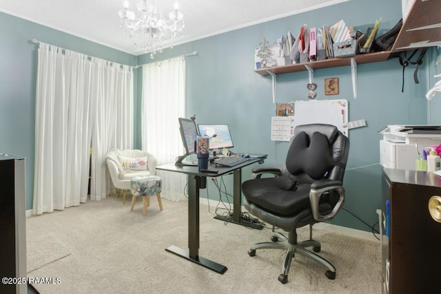 office space with a chandelier, ornamental molding, carpet flooring, and baseboards
