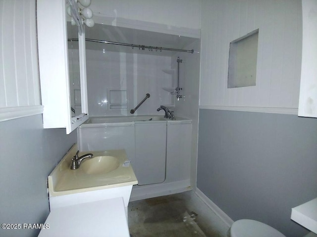 full bath with a sink, a tub to relax in, and a shower