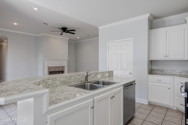 kitchen featuring stainless steel dishwasher, visible vents, ceiling fan, a sink, and light tile patterned floors
