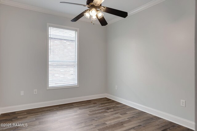 spare room with crown molding, wood finished floors, and a healthy amount of sunlight