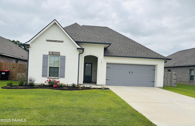 131 Wild Cherry Ln, Lafayette, LA 70508 - view of front facade featuring an attached garage, driveway, and roof with shingles