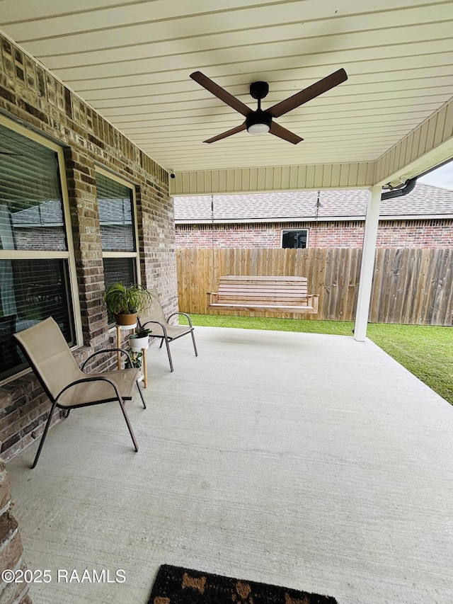 131 Wild Cherry Ln, Lafayette, LA 70508 - view of patio / terrace featuring ceiling fan and fence