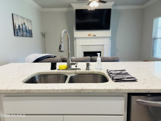 131 Wild Cherry Ln, Lafayette, LA 70508 - kitchen featuring a sink, stainless steel dishwasher, light stone countertops, crown molding, and ceiling fan