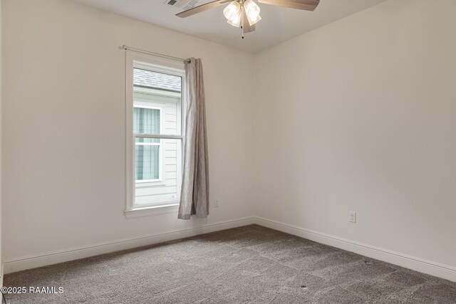 unfurnished room featuring a ceiling fan, carpet flooring, and baseboards