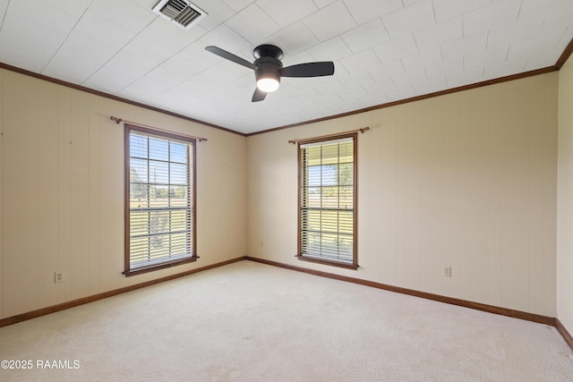 319 Roger Rd, Lafayette, LA 70507 - unfurnished room featuring plenty of natural light, light colored carpet, ornamental molding, and ceiling fan