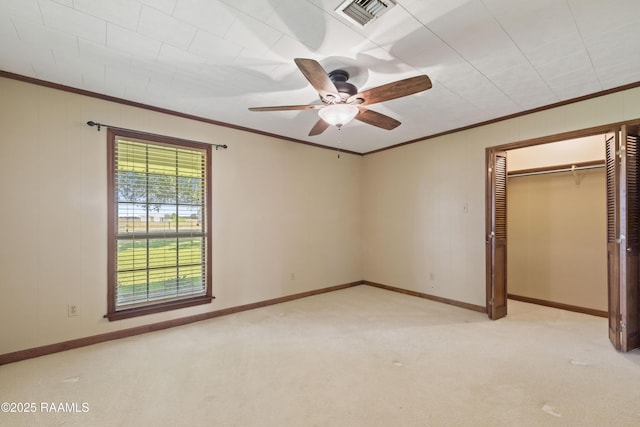 319 Roger Rd, Lafayette, LA 70507 - unfurnished bedroom with ornamental molding, light colored carpet, a closet, and ceiling fan
