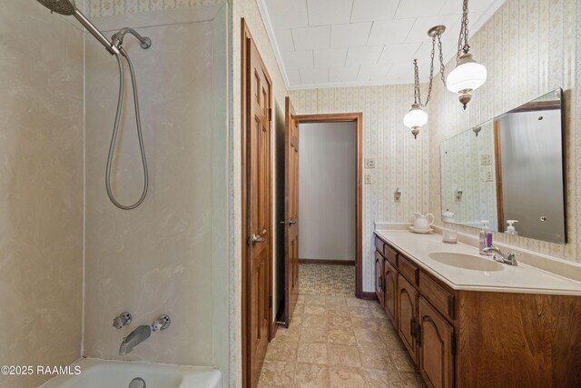 319 Roger Rd, Lafayette, LA 70507 - full bath featuring wallpapered walls, vanity, tub / shower combination, and crown molding