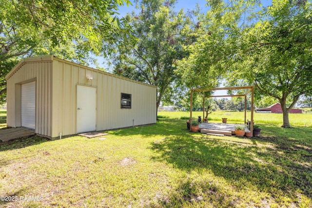 319 Roger Rd, Lafayette, LA 70507 - view of green lawn featuring an outdoor structure