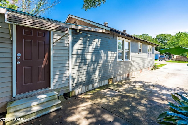 view of home's exterior featuring entry steps