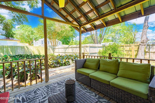 sunroom with an outdoor hangout area
