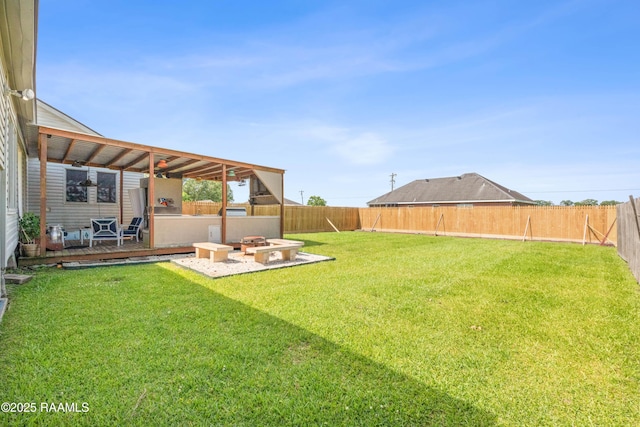 202 Sapphire Dr, Lafayette, LA 70506 - view of yard featuring a fenced backyard and a fire pit