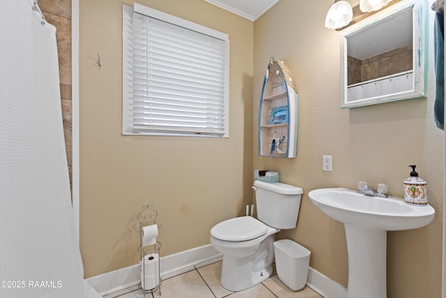 202 Sapphire Dr, Lafayette, LA 70506 - full bathroom featuring tile patterned floors, toilet, baseboards, and crown molding