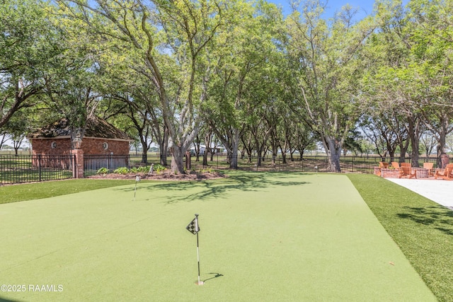 view of property's community with fence