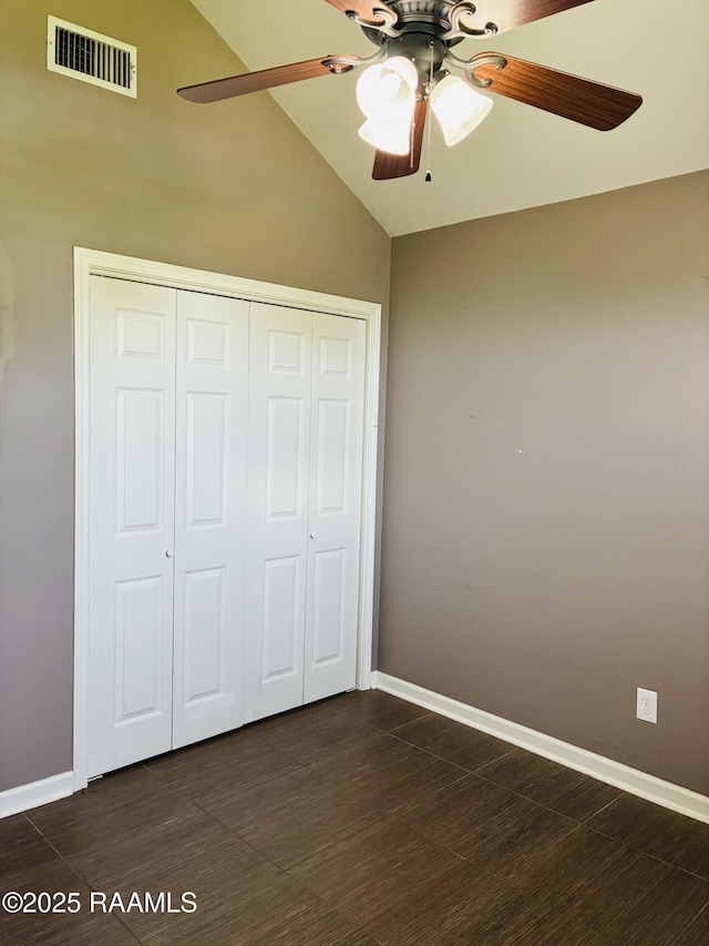 104 Bismark Dr, Broussard, LA 70518 - unfurnished bedroom featuring lofted ceiling, a closet, baseboards, and ceiling fan