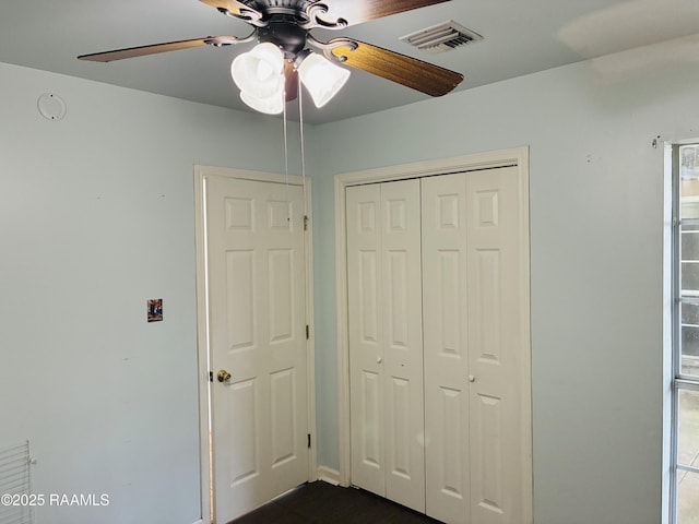 104 Bismark Dr, Broussard, LA 70518 - unfurnished bedroom featuring a closet and ceiling fan