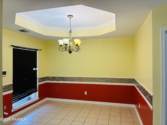 104 Bismark Dr, Broussard, LA 70518 - unfurnished room with a chandelier, a raised ceiling, crown molding, and light tile patterned flooring