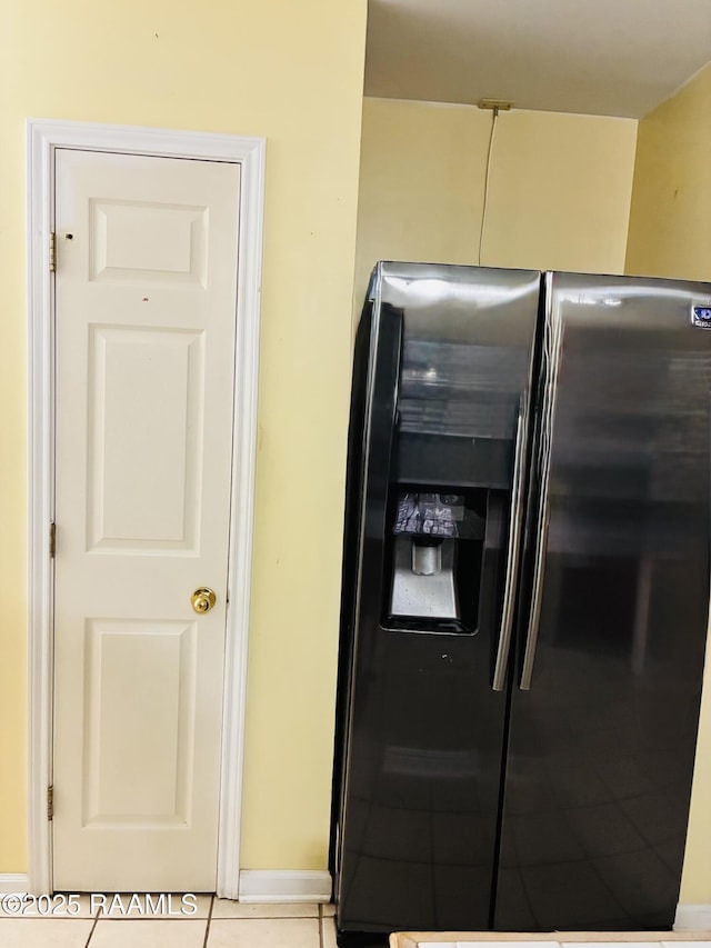 104 Bismark Dr, Broussard, LA 70518 - kitchen with fridge with ice dispenser and tile patterned floors