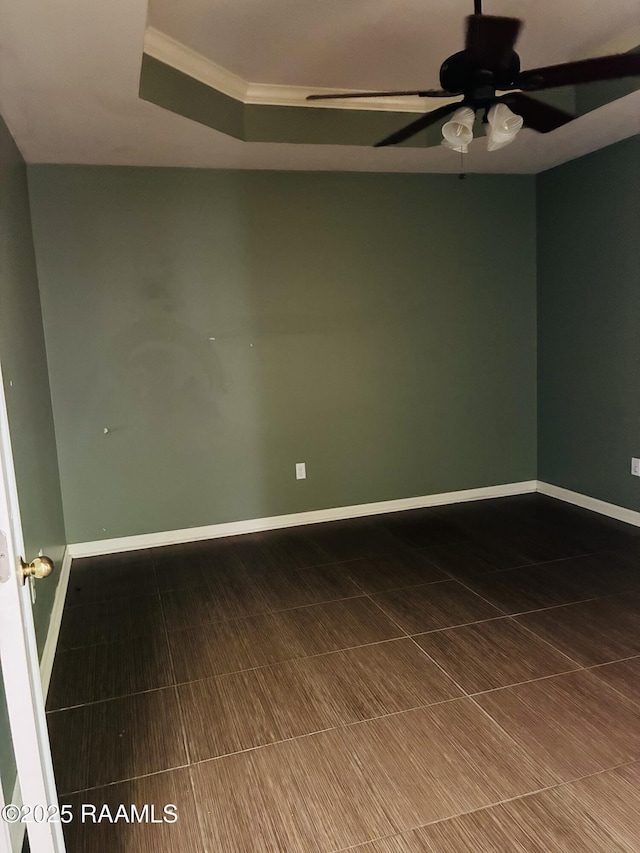 104 Bismark Dr, Broussard, LA 70518 - unfurnished room featuring a ceiling fan, baseboards, a tray ceiling, and crown molding