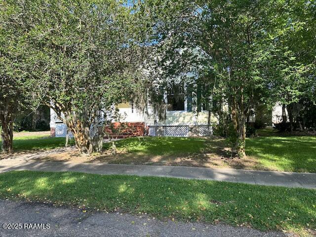 505 Fairview Ave, Abbeville, LA 70510 - view of front of home with a front yard