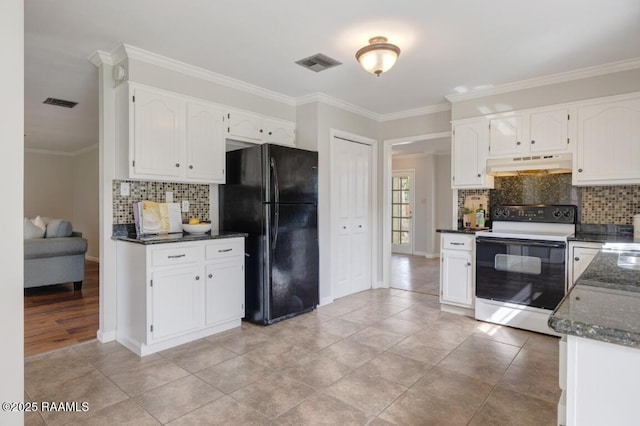 204 Eva Dr, Lafayette, LA 70508 - kitchen with freestanding refrigerator, electric range, visible vents, under cabinet range hood, and ornamental molding