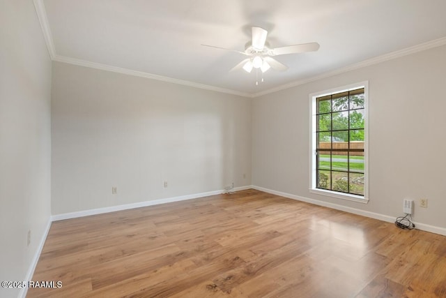 204 Eva Dr, Lafayette, LA 70508 - spare room featuring a ceiling fan, light wood-style floors, crown molding, and baseboards