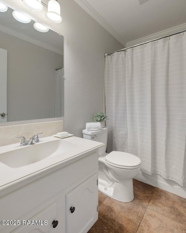 204 Eva Dr, Lafayette, LA 70508 - bathroom featuring shower / tub combo, toilet, ornamental molding, tile patterned flooring, and vanity
