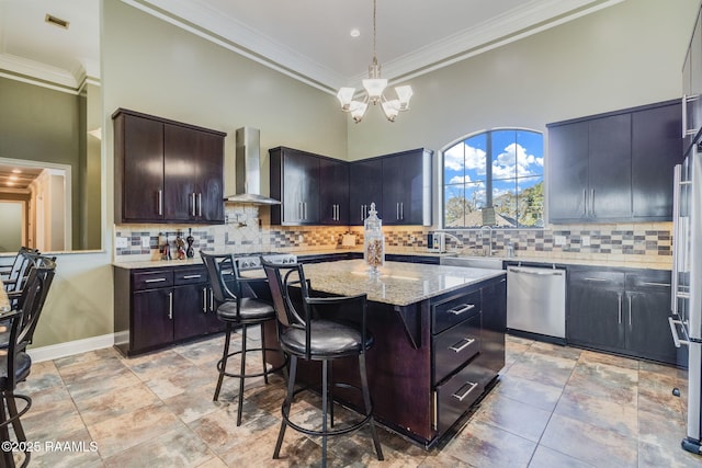 1319 W Gloria Switch Rd, Carencro, LA 70520 - kitchen featuring a high ceiling, stainless steel dishwasher, wall chimney range hood, a chandelier, and light stone counters