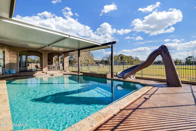 1319 W Gloria Switch Rd, Carencro, LA 70520 - view of swimming pool featuring fence, a fenced in pool, and a water slide