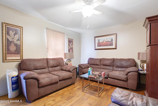1405 Pelican St, New Iberia, LA 70560 - living area featuring a ceiling fan and light wood-style floors