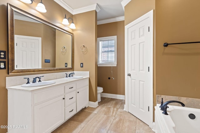 full bath with crown molding, double vanity, toilet, a garden tub, and baseboards