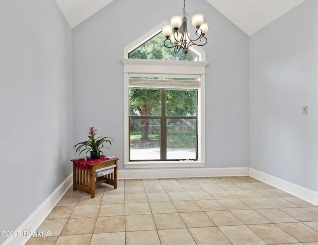 dining space featuring vaulted ceiling, a chandelier, light tile patterned floors, and baseboards